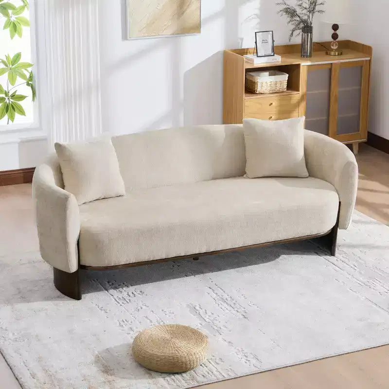 Canapé moderne en bouclette avec base en bois et coussins