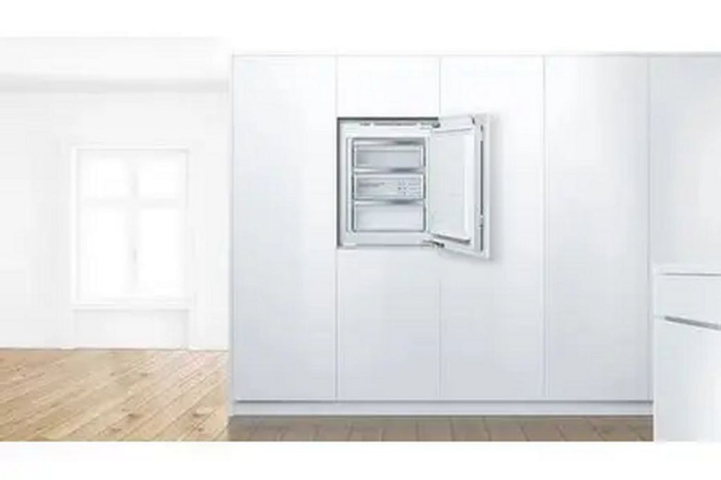 Bosch GIV11AFE0 met open deur en drie transparante vrieslades