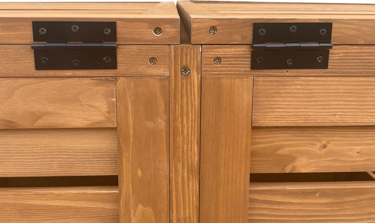 Mülltonnenbox in einer Einfahrt aufgestellt