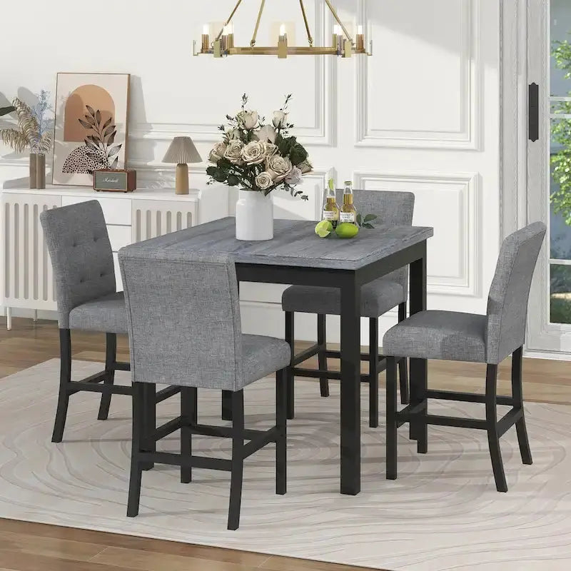 Vijfdelige counter-eethoek met zwarte tafel en grijze stoelen